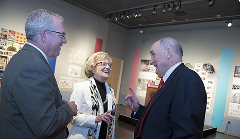 IU alumnus Eric Hayes (left) has a conversation with IU President Michael A. McRobbie.