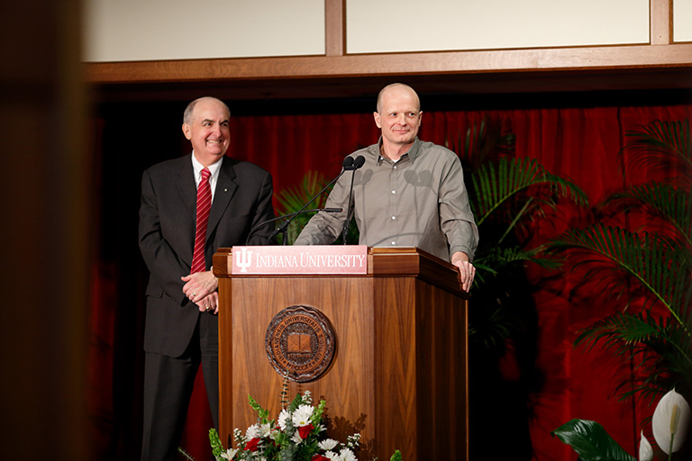 IU President Michael A. McRobbie (left) and Professor of Biology Armin Moczek smile in reaction t...