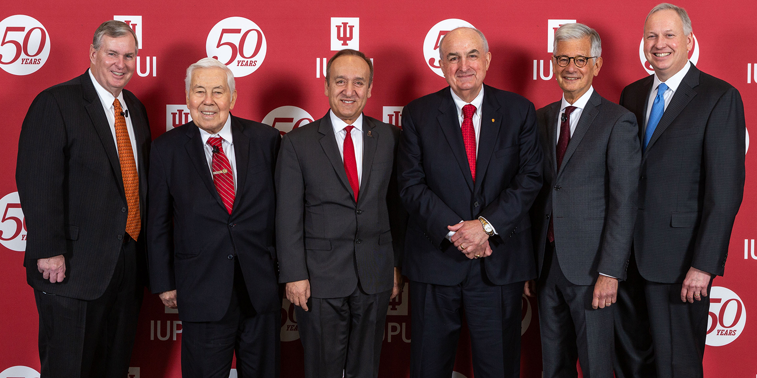 IU President and IUPUI Chancellor stand with former Indianapolis mayors