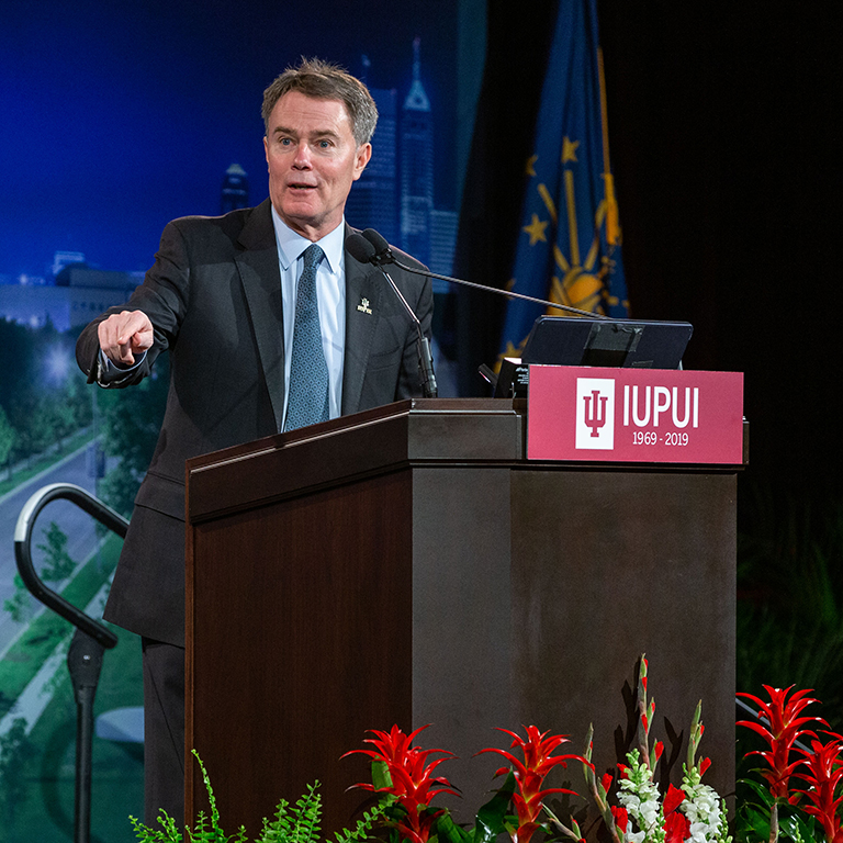 Indianapolis Mayor Joe Hogsett speaks from a podium