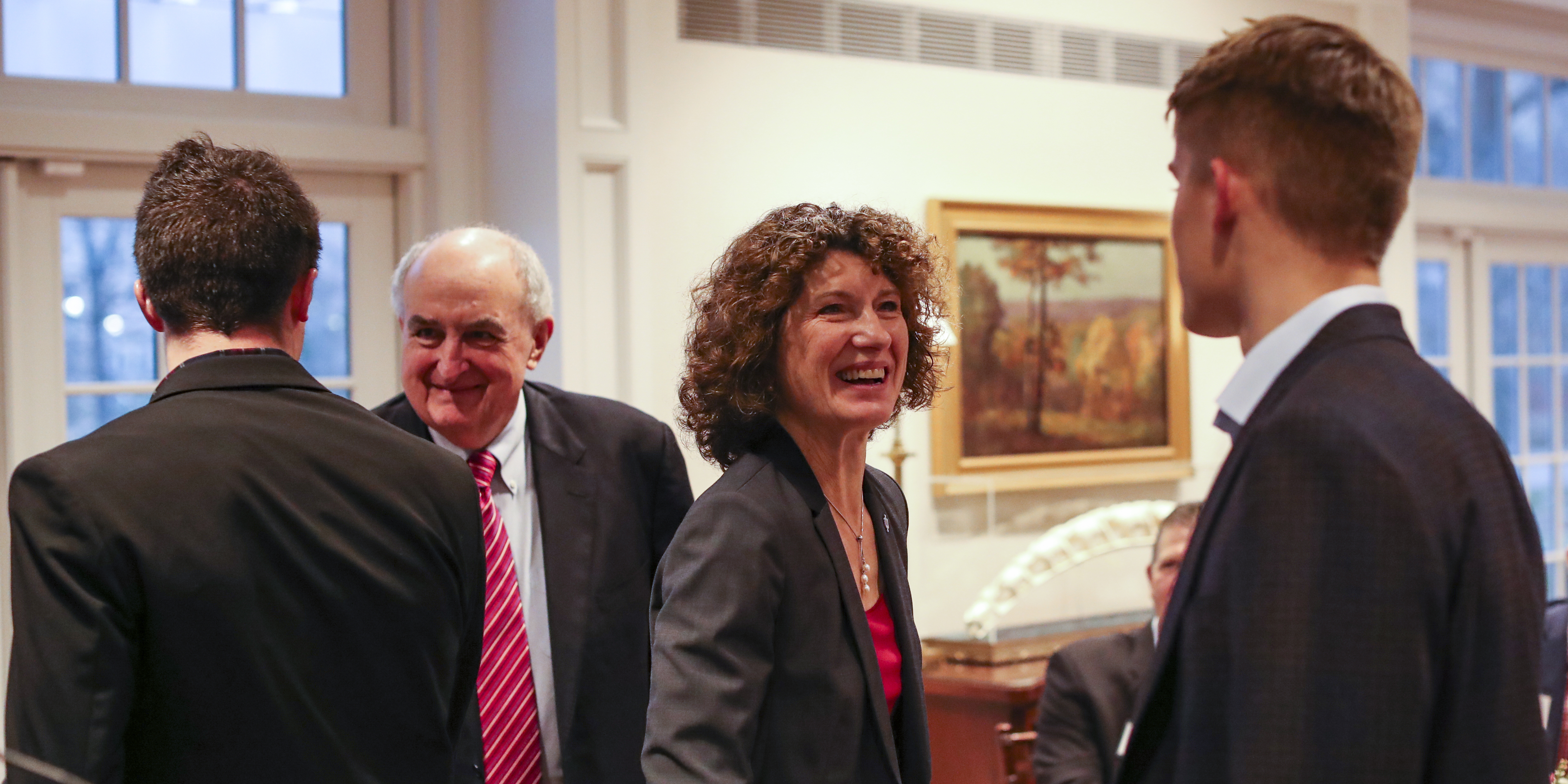 IU President and First Lady McRobbie greet members of the IU men's soccer team 