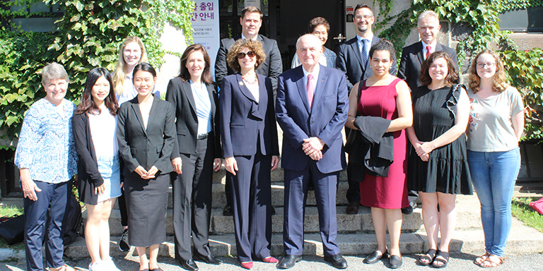 IU President McRobbie stands with a group of students